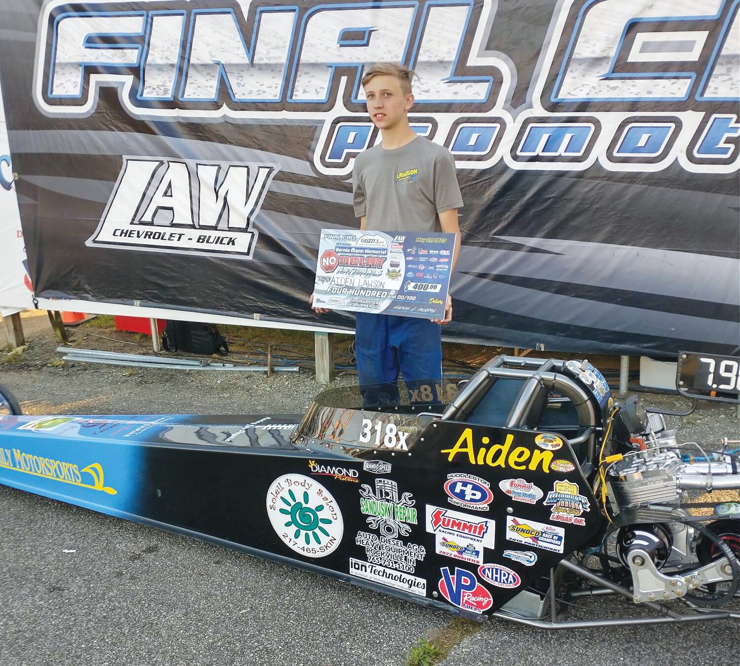 Aiden Lawson poses with his check from Wabash Valley Dragway after finishing runner-up at the Bernie Mann No Delay races during Memorial Day weekend.