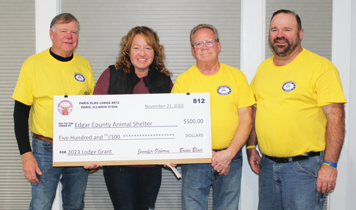 Andrea Bouslog accepted a $500 donation on behalf of the Edgar County Animal Shelter from Paris Elks Lodge #812. Left to right are Jim Cooper, Bouslog, Ray Korte and Chad Stevens.