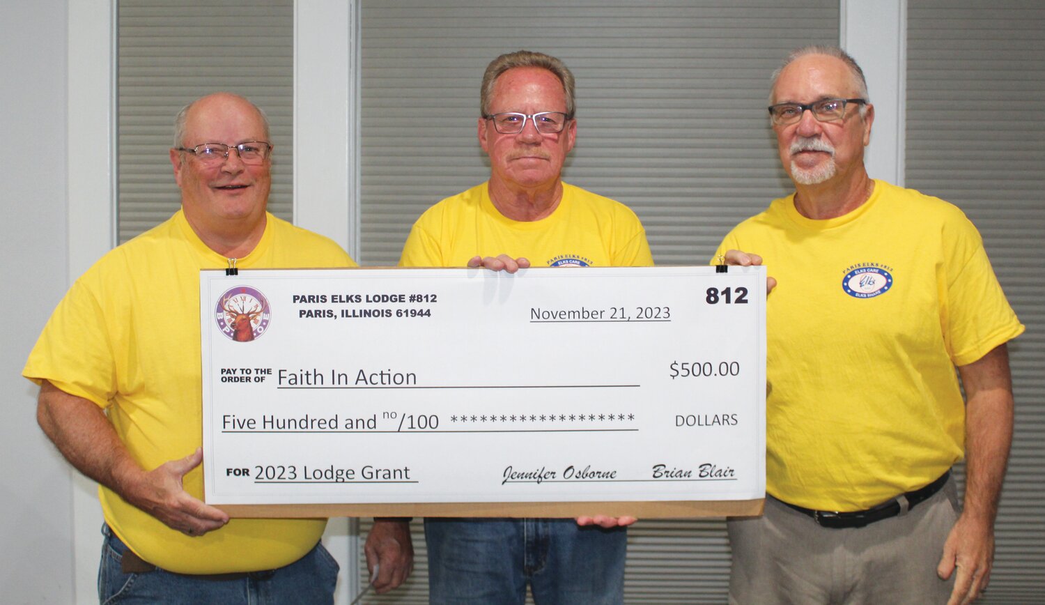 The Paris Elks Lodge #812 donated $500 to Faith in Action. Left to right are Greg Irwin, Ray Korte and Jim Osborne.