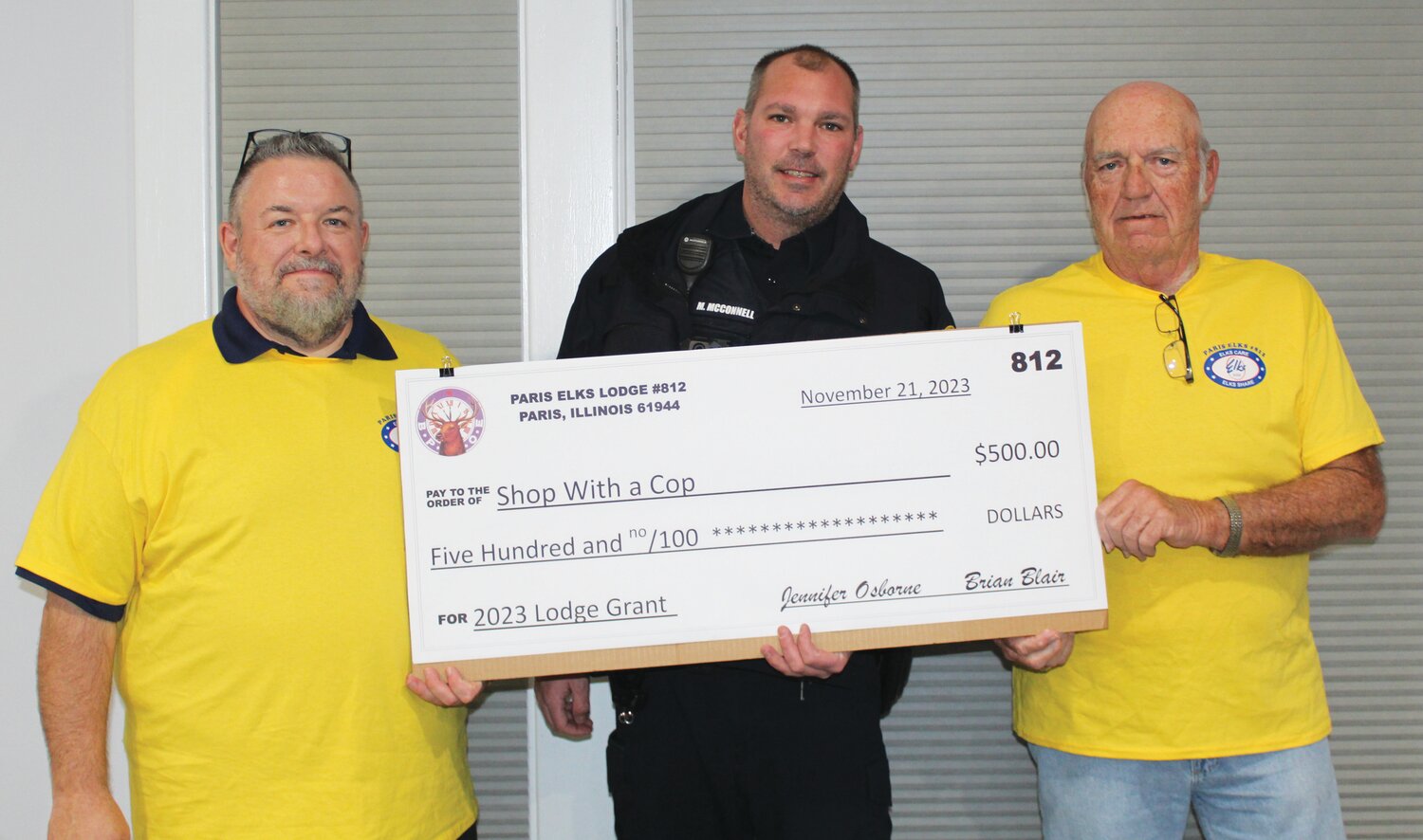 Shop with a Cop received a $500 donation from the Paris Elks. Left to right are Brian Blair, Matthew McConnell and Don Humphrey.